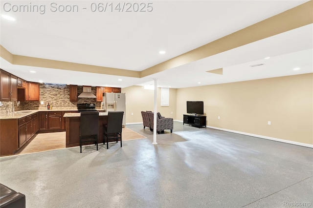 13563 Trotters Ln, Sterling Heights, MI 48313 - kitchen featuring wall chimney range hood, a kitchen island, backsplash, recessed lighting, and a kitchen breakfast bar