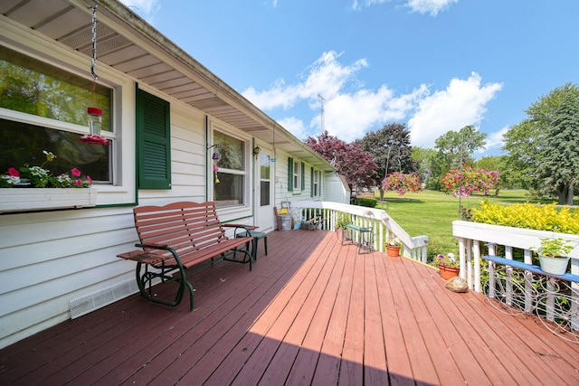3684 W Howell Rd, Mason, MI 48854 - wooden deck with a yard