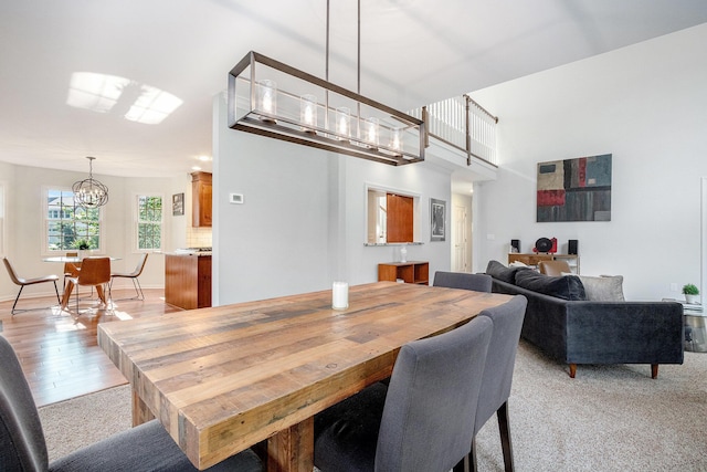 1415 Blackhawk Trl, Benton Harbor, MI 49022 - dining room featuring a chandelier and baseboards