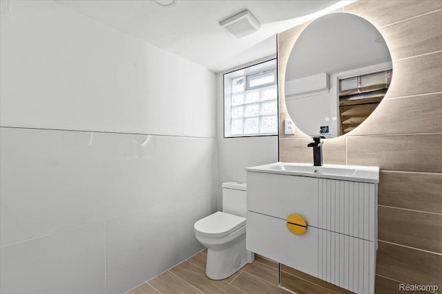 475 Algonquin St, Detroit, MI 48215 - half bath with vanity and wood finish floors