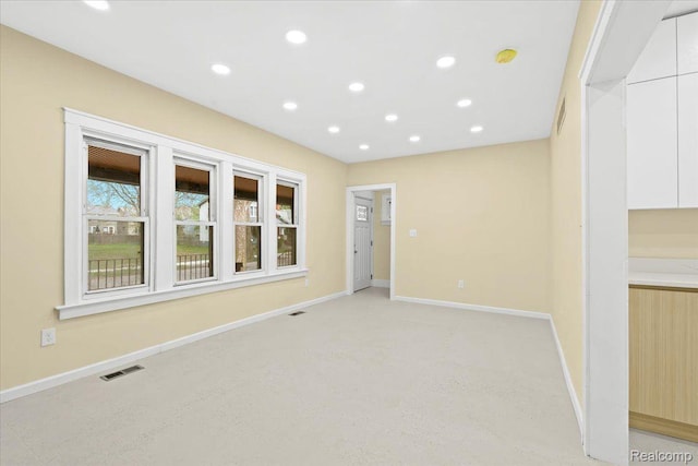 475 Algonquin St, Detroit, MI 48215 - unfurnished room with light colored carpet, recessed lighting, and a smoke detector