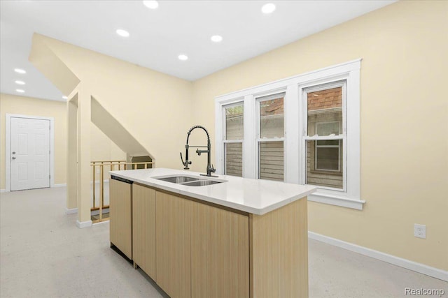 475 Algonquin St, Detroit, MI 48215 - kitchen with recessed lighting, light brown cabinets, modern cabinets, light countertops, and an island with sink