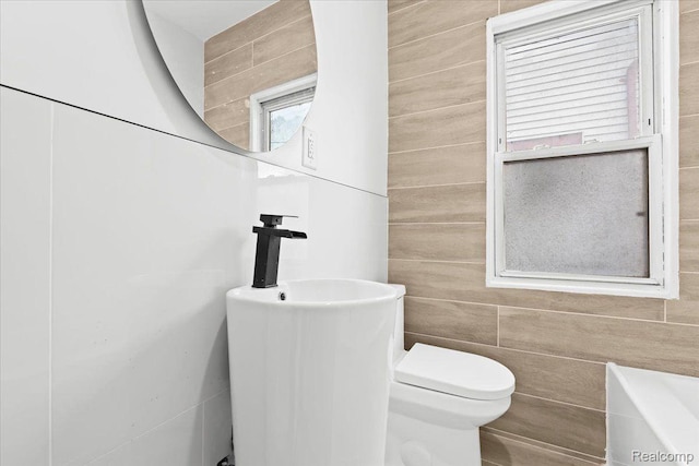 475 Algonquin St, Detroit, MI 48215 - bathroom with tile walls and a tub to relax in