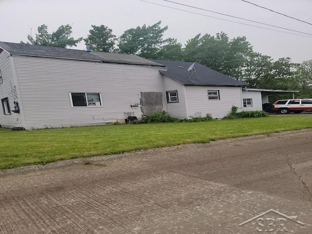 2723 Van Etten St, Saginaw, MI 48601 - view of property exterior with a yard