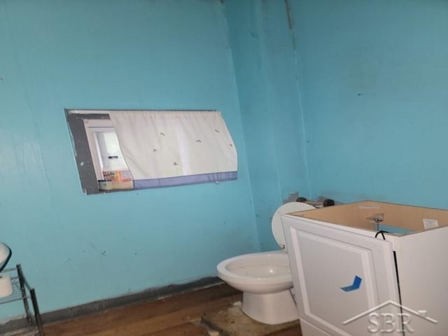 2723 Van Etten St, Saginaw, MI 48601 - bathroom featuring wood finished floors and toilet