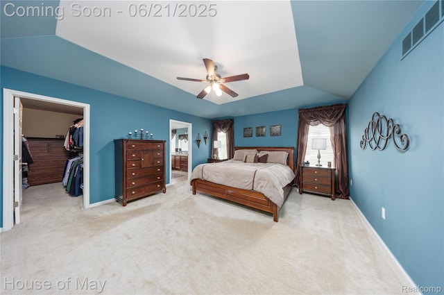1768 Carriage Hl, Commerce Twp, MI 48382 - bedroom featuring a walk in closet, carpet floors, a closet, and ceiling fan