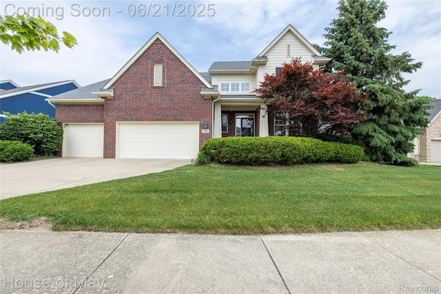 1768 Carriage Hl, Commerce Twp, MI 48382 - view of front of house with a front lawn, brick siding, driveway, and an attached garage