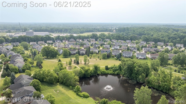 1768 Carriage Hl, Commerce Twp, MI 48382 - aerial view of residential area featuring a nearby body of water
