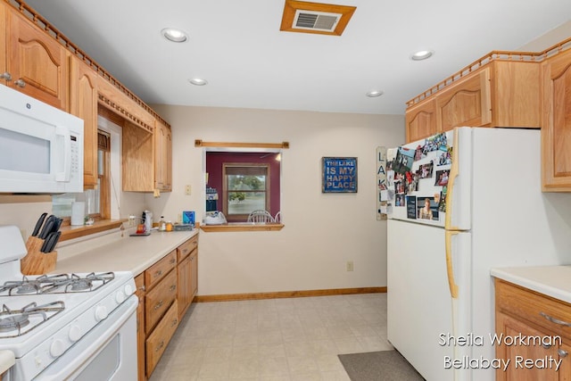 1725 Ottawa Trl, Hastings, MI 49058 - kitchen with white appliances, light countertops, and recessed lighting