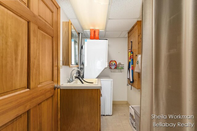 1725 Ottawa Trl, Hastings, MI 49058 - washroom featuring cabinet space and baseboards