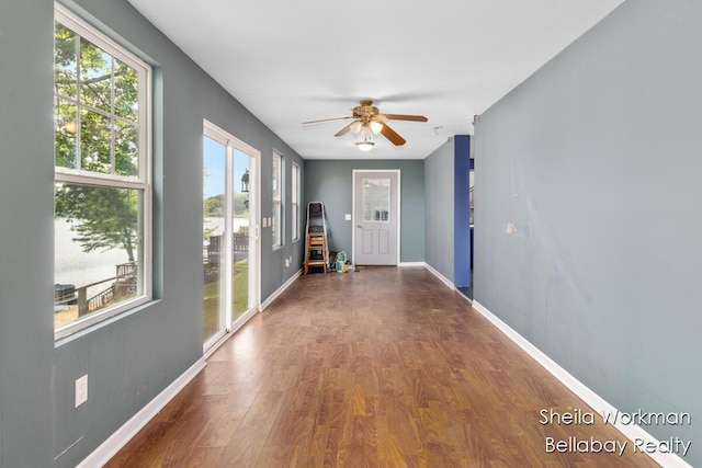 1725 Ottawa Trl, Hastings, MI 49058 - doorway featuring wood finished floors, healthy amount of natural light, and a ceiling fan