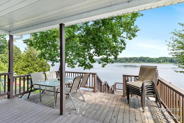 1725 Ottawa Trl, Hastings, MI 49058 - wooden deck with a water view and outdoor dining space