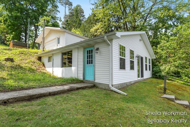 1725 Ottawa Trl, Hastings, MI 49058 - view of property exterior featuring a lawn