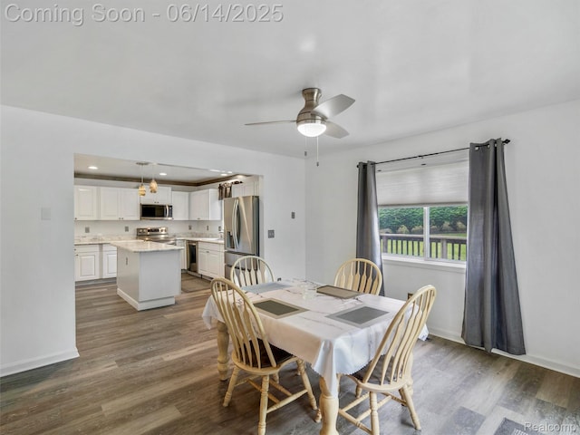4960 Paula Ave, Clarkston, MI 48346 - dining space with dark wood-style flooring, a ceiling fan, and recessed lighting