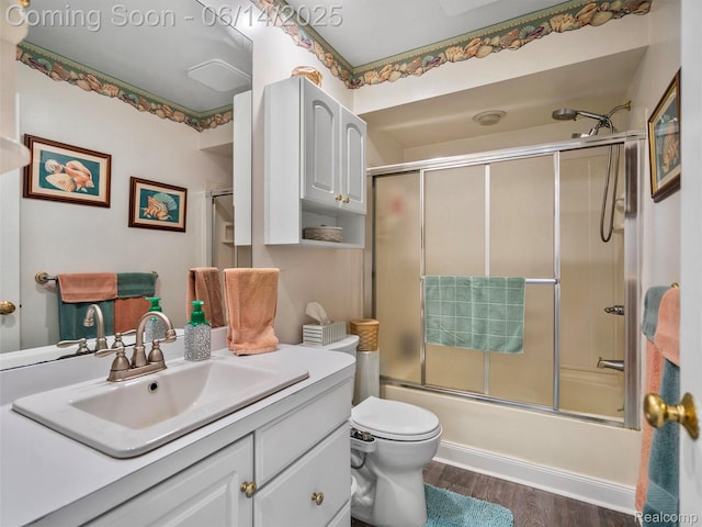 4960 Paula Ave, Clarkston, MI 48346 - full bathroom featuring vanity, wood finished floors, and combined bath / shower with glass door