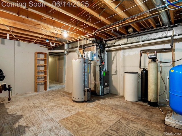 4960 Paula Ave, Clarkston, MI 48346 - unfinished below grade area with gas water heater, a water softener, heating unit, and a water pressure tank