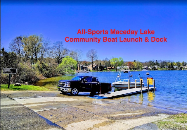 4960 Paula Ave, Clarkston, MI 48346 - dock area featuring a boat ramp and a water view