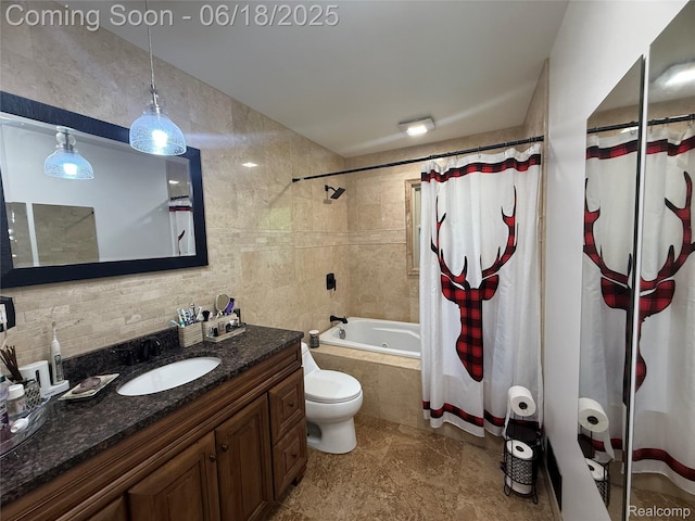6715 Elizabeth Lake Rd, Waterford, MI 48327 - bathroom featuring vanity, tiled shower / bath, and tile walls