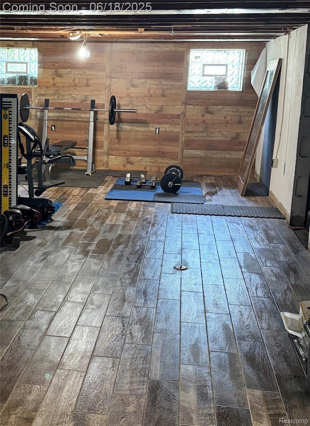 6715 Elizabeth Lake Rd, Waterford, MI 48327 - workout room featuring wood walls and hardwood / wood-style flooring