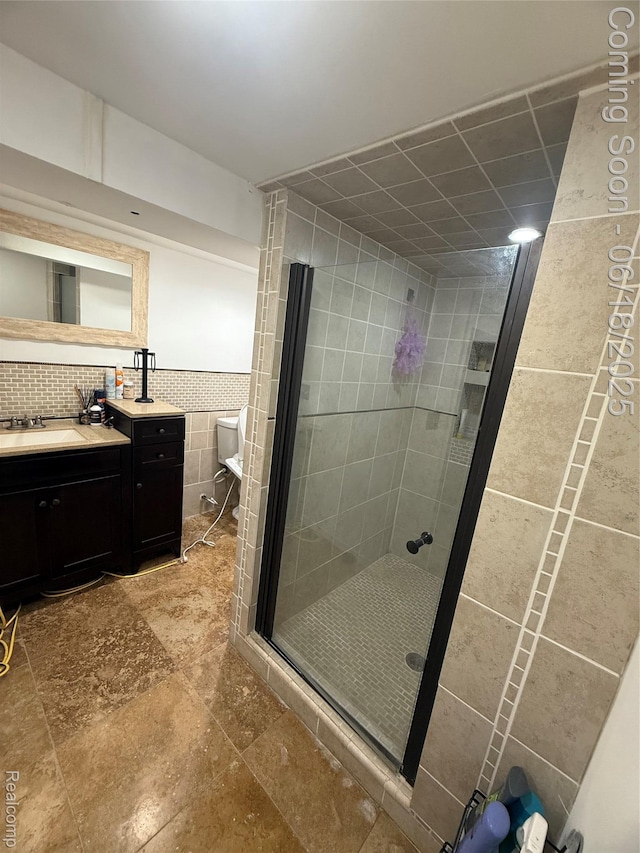 6715 Elizabeth Lake Rd, Waterford, MI 48327 - bathroom with vanity, tile walls, and a shower stall