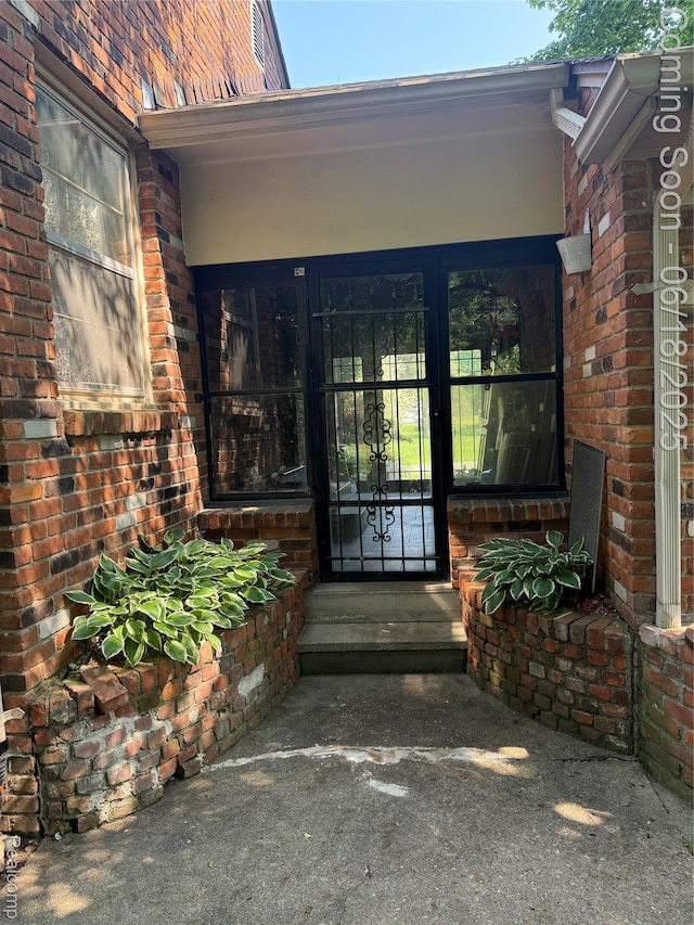 6715 Elizabeth Lake Rd, Waterford, MI 48327 - entrance to property featuring brick siding