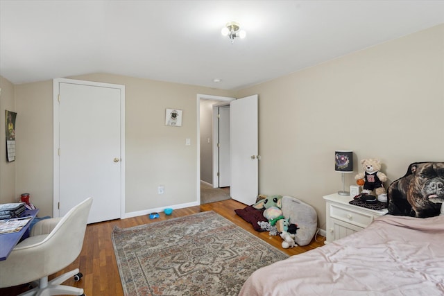 14747 A Dr N, Marshall, MI 49068 - bedroom featuring wood finished floors and lofted ceiling