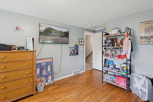 14747 A Dr N, Marshall, MI 49068 - recreation room with wood finished floors and baseboards