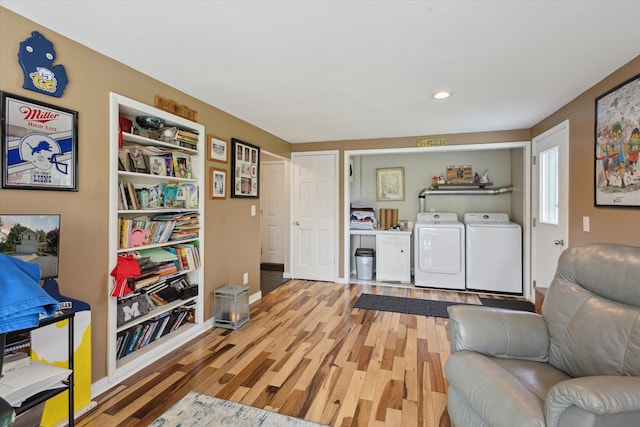 14747 A Dr N, Marshall, MI 49068 - sitting room featuring washing machine and clothes dryer, light wood finished floors, and recessed lighting