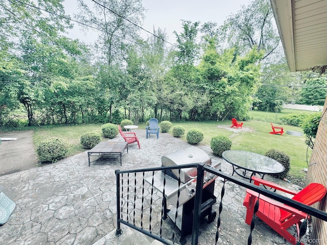 24230 Berg Rd, Commerce Twp, MI 48033 - view of patio featuring area for grilling and view of scattered trees