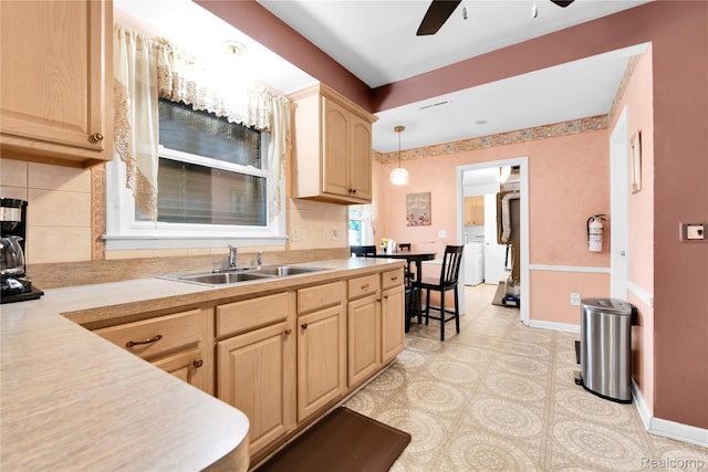 24710 Lathrup Blvd, Southfield, MI 48075 - kitchen with light brown cabinetry, ceiling fan, light countertops, and backsplash