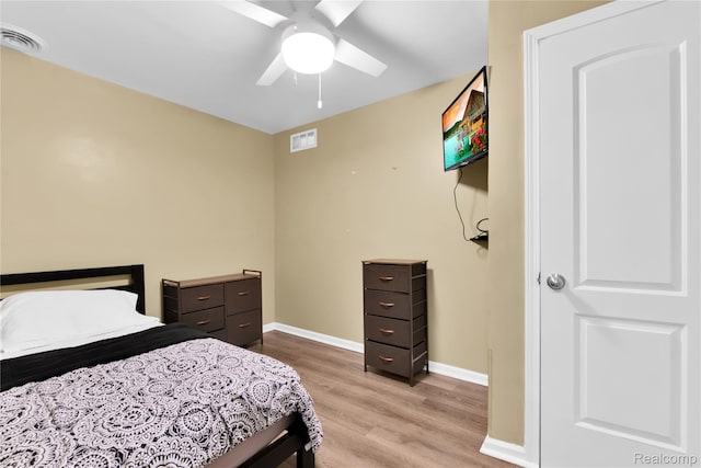 24710 Lathrup Blvd, Southfield, MI 48075 - bedroom with wood finished floors and ceiling fan