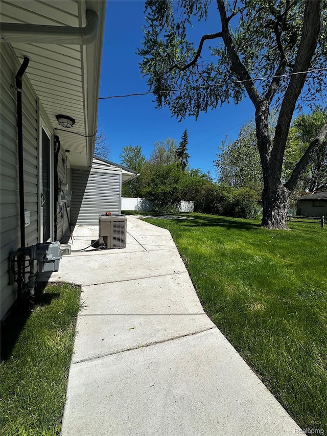 24710 Lathrup Blvd, Southfield, MI 48075 - view of green lawn featuring a patio area