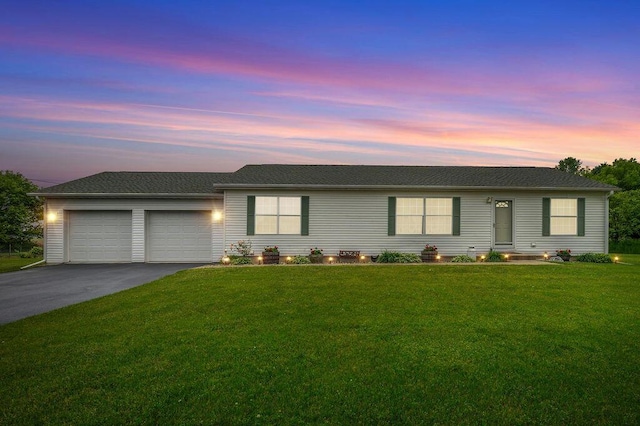 66291 M-62, Edwardsburg, MI 49112 - ranch-style house featuring driveway, an attached garage, and a front yard