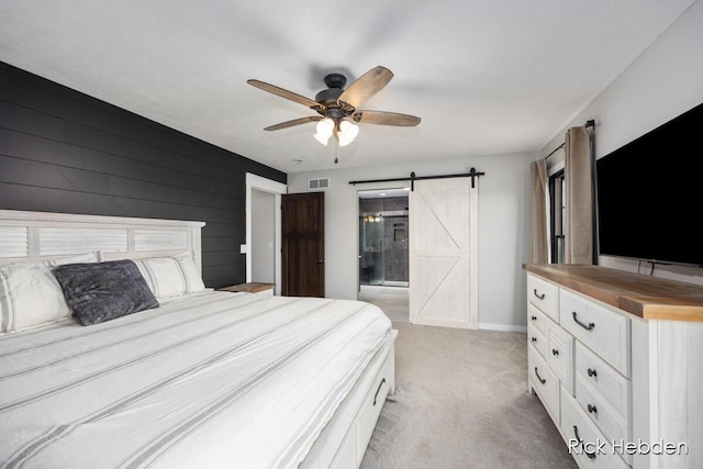 1153 S Edgar Rd, Mason, MI 48854 - bedroom featuring light carpet, a barn door, and ceiling fan