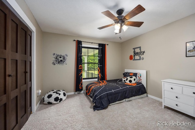 1153 S Edgar Rd, Mason, MI 48854 - carpeted bedroom featuring baseboards and a ceiling fan