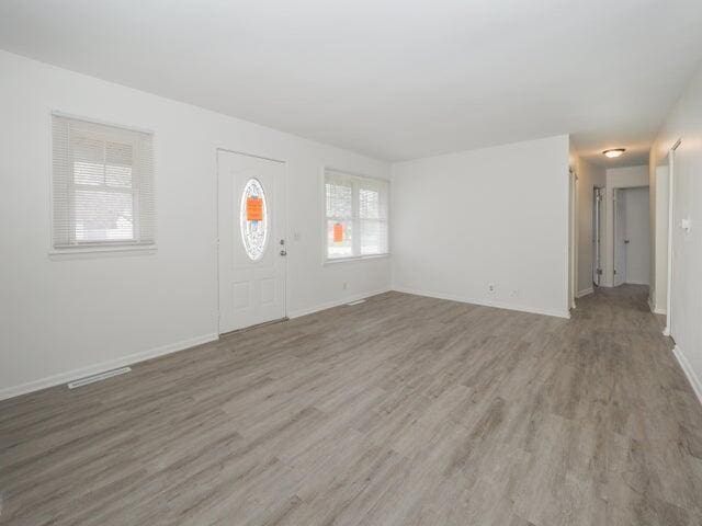 1314 Magnolia St, Kalamazoo, MI 49048 - foyer with light wood-type flooring and baseboards