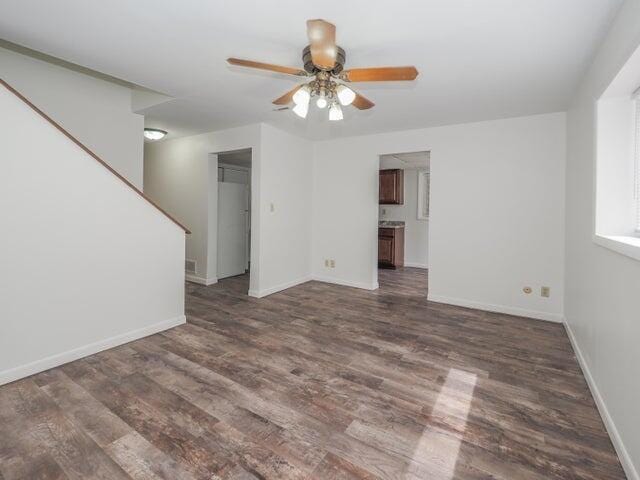 1516 Nazareth Rd, Kalamazoo, MI 49048 - spare room with ceiling fan, wood finished floors, and stairway