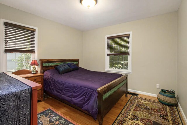 1307 Edgewood Ave, Ann Arbor, MI 48103 - bedroom featuring light wood-type flooring and baseboards