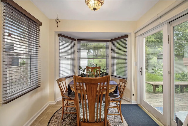 1307 Edgewood Ave, Ann Arbor, MI 48103 - dining room with baseboards and tile patterned floors