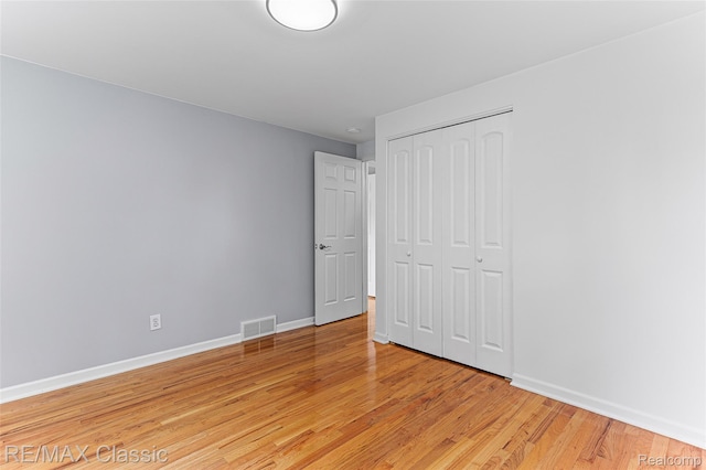 1915 Treadwell St, Westland, MI 48186 - unfurnished bedroom with light wood-style floors and a closet