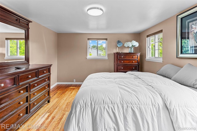 1915 Treadwell St, Westland, MI 48186 - bedroom with multiple windows and light wood-type flooring