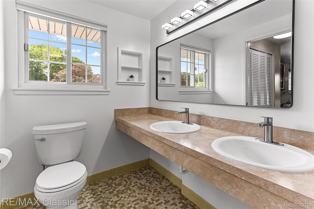 1915 Treadwell St, Westland, MI 48186 - bathroom featuring plenty of natural light and double vanity