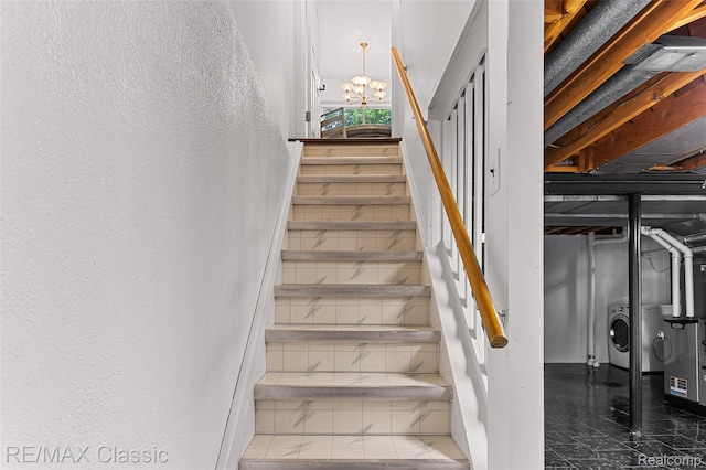 1915 Treadwell St, Westland, MI 48186 - staircase with independent washer and dryer, a chandelier, and marble finish flooring