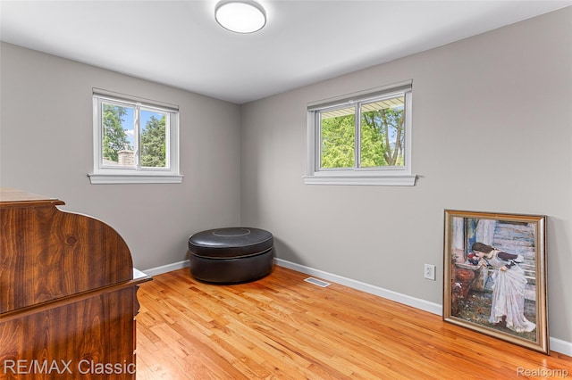 1915 Treadwell St, Westland, MI 48186 - living area featuring light wood-type flooring and baseboards