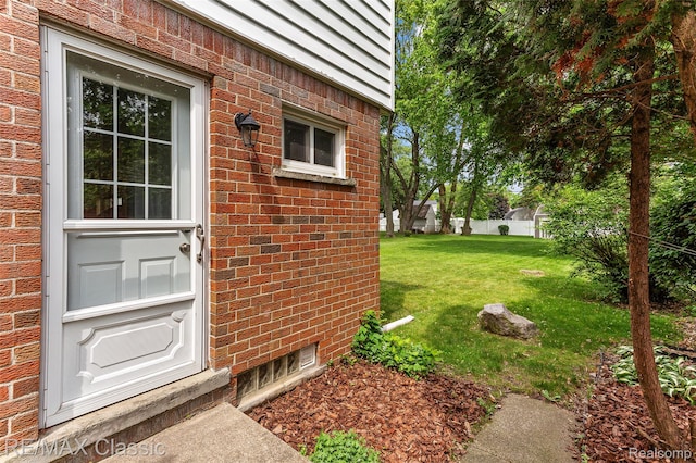 1915 Treadwell St, Westland, MI 48186 - doorway to property with brick siding
