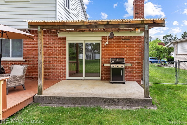 1915 Treadwell St, Westland, MI 48186 - rear view of property featuring a wooden deck, brick siding, a pergola, and a chimney