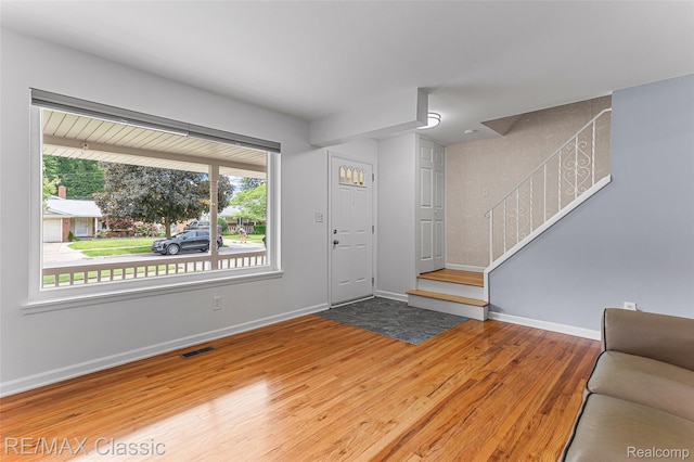 1915 Treadwell St, Westland, MI 48186 - entryway featuring stairs and wood finished floors