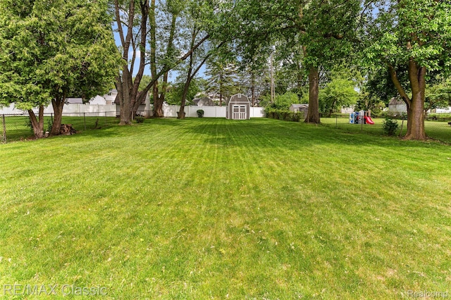 1915 Treadwell St, Westland, MI 48186 - fenced backyard with a shed