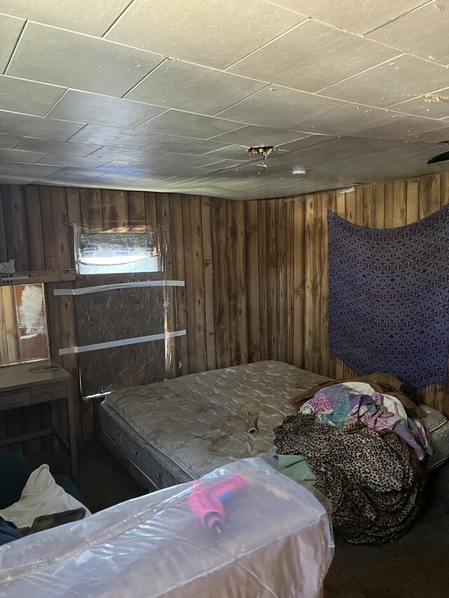 928 Trimble Ave, Kalamazoo, MI 49048 - bedroom featuring wooden walls
