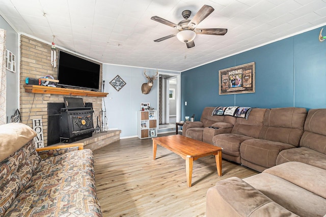 5468 S Custer Rd, Custer, MI 49405 - living room with ceiling fan, crown molding, and wood finished floors